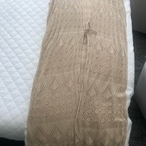 Cap sleeve khaki in color sweater poncho calf length. Excellent condition.